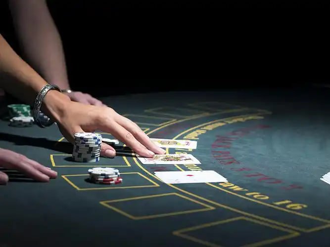 hawkplay 999 mobile app interface showing casino and sports betting on a smartphone